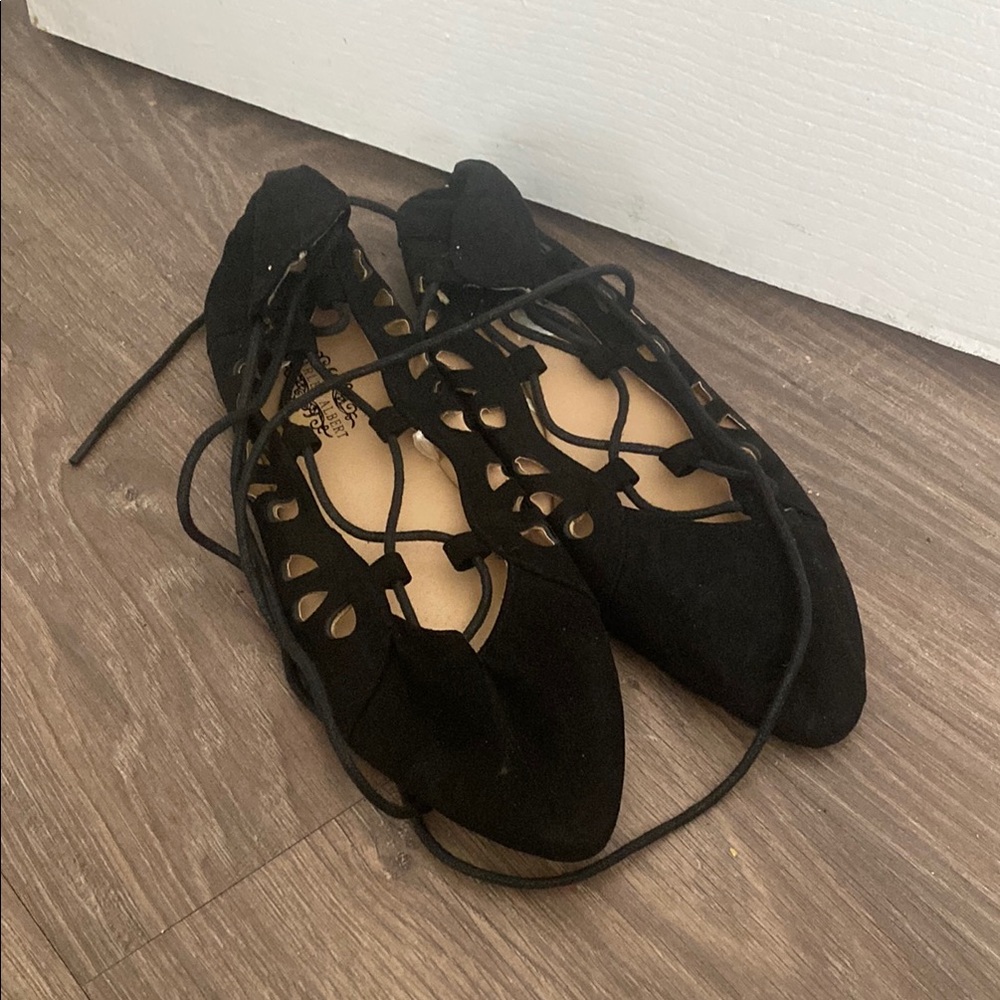 Charles Albert Black Flats with Elegant Lace-Up Design